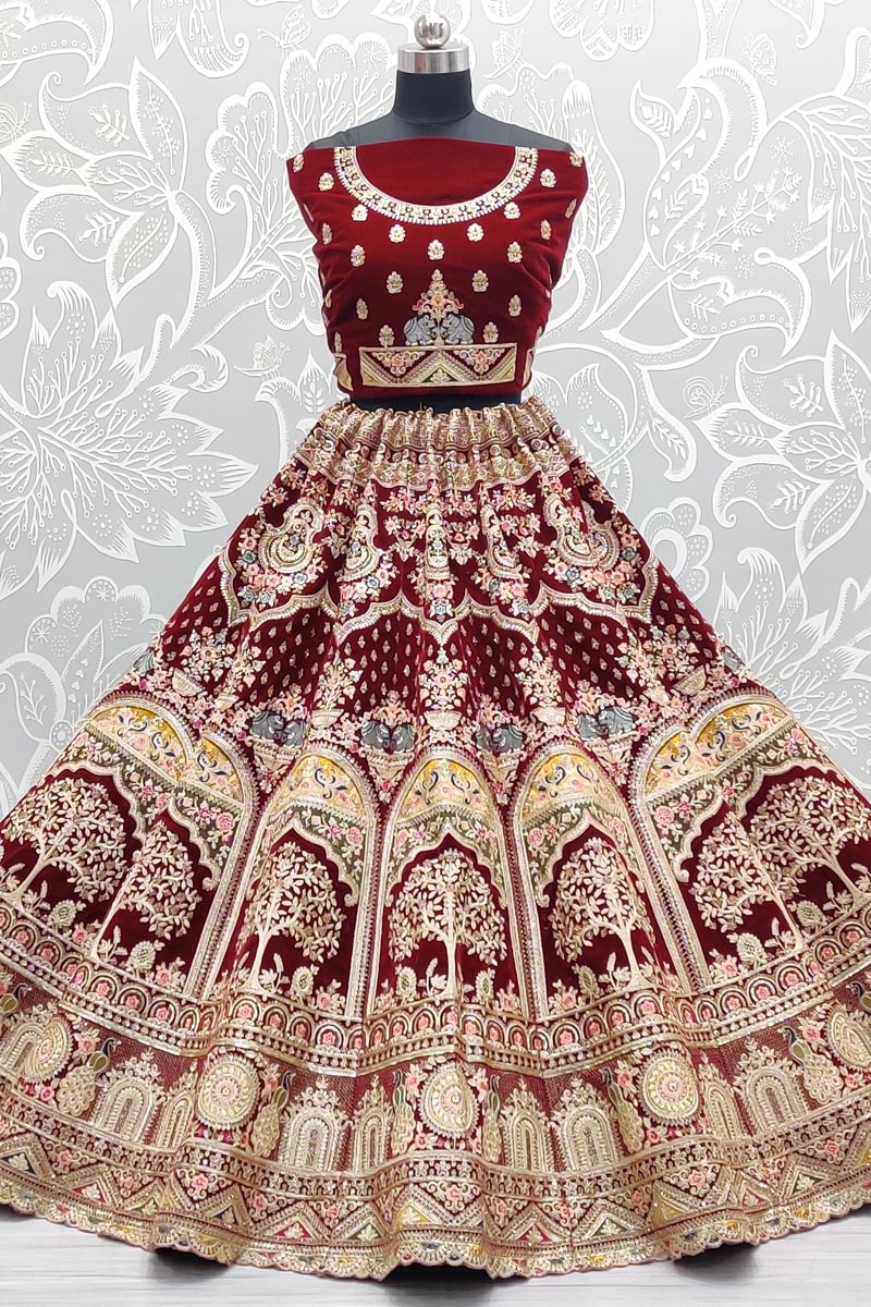 Pleasant Velvet Fabric Bridal Lehenga In Maroon Color