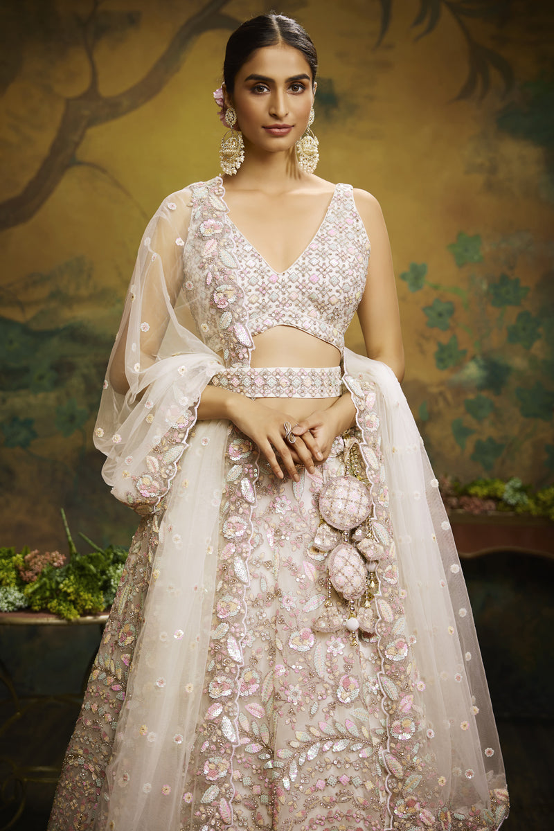 Awesome Embroidered Work On Net Fabric Cream Color Wedding Wear Lehenga Choli