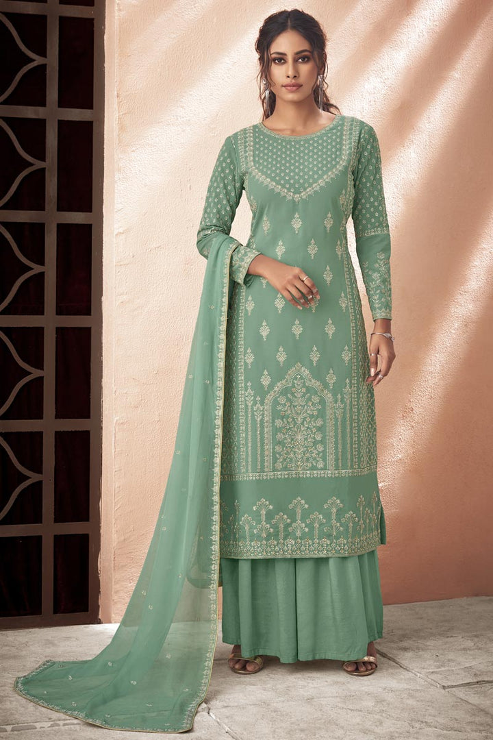 Sea Green Color Embroidered Festive Wear Fancy Fabric Palazzo Suit