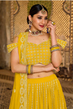 Load image into Gallery viewer, Yellow Color Wedding Wear Embroidered Work Georgette Fabric Lehenga Choli
