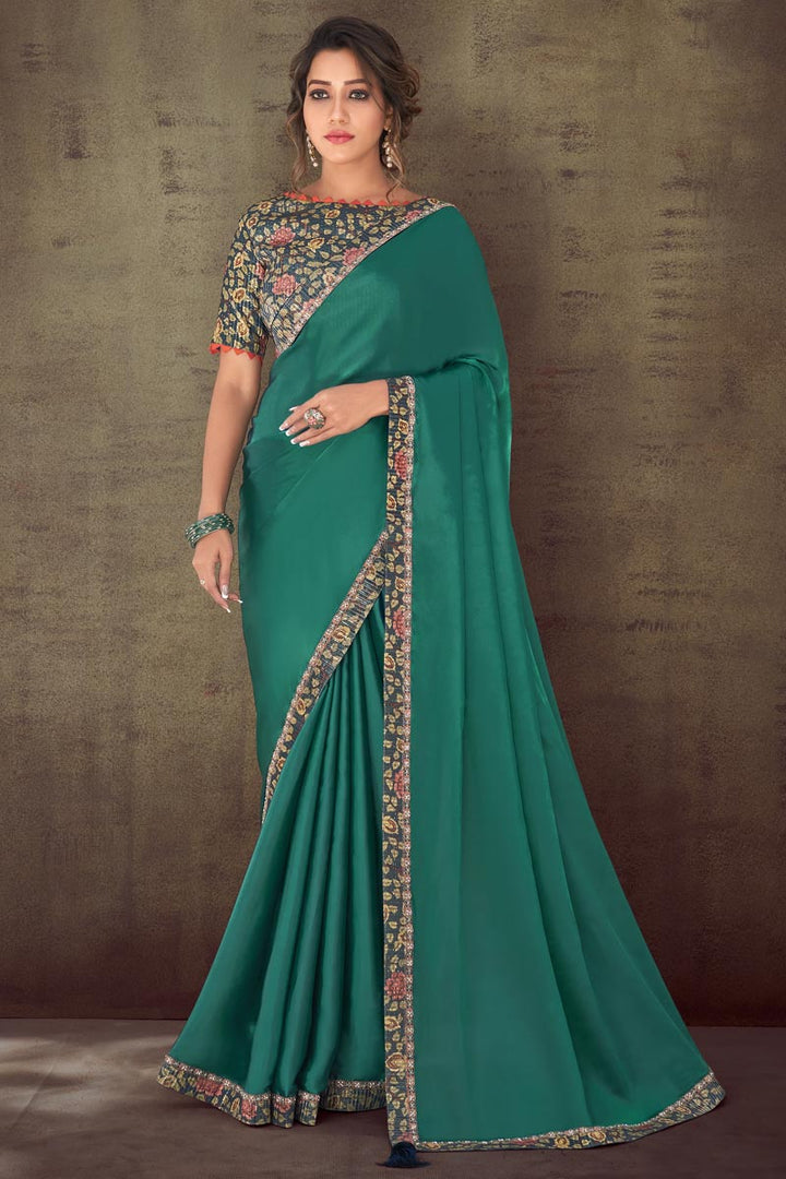 Excellent Organza Fabric Green Color Saree With Border Work
