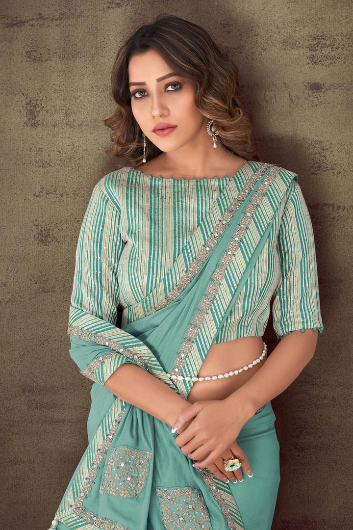 Engaging Light Cyan Color Crepe Fabric Saree With Border Work