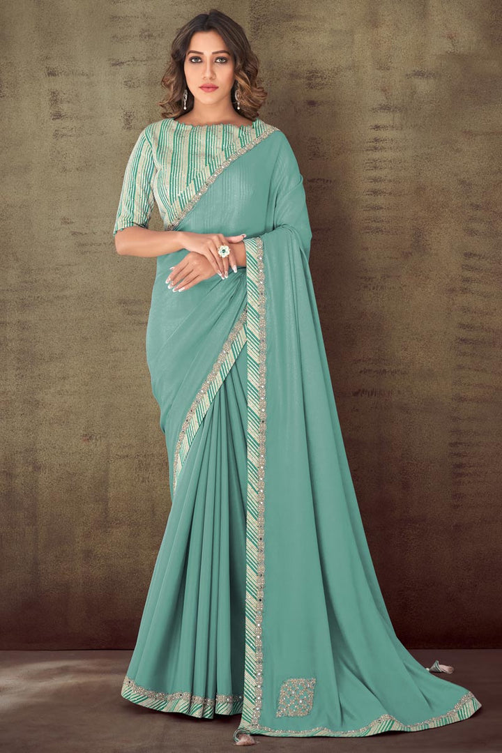 Engaging Light Cyan Color Crepe Fabric Saree With Border Work