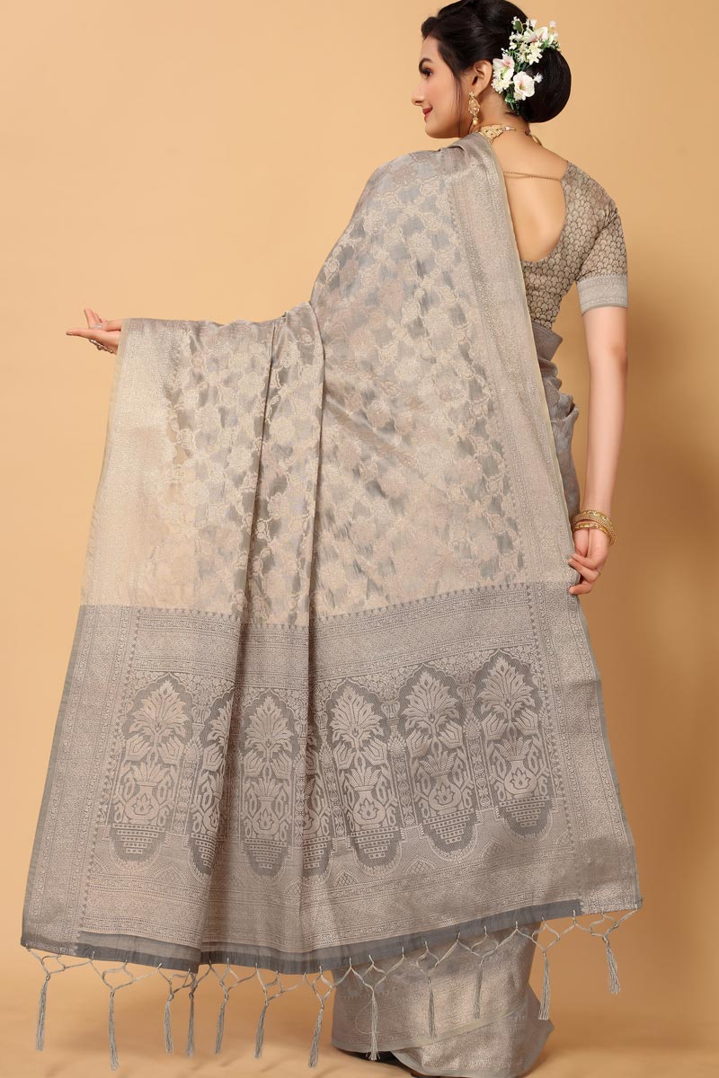 Excellent Function Wear Organza Fabric Grey Color Saree With Weaving Work
