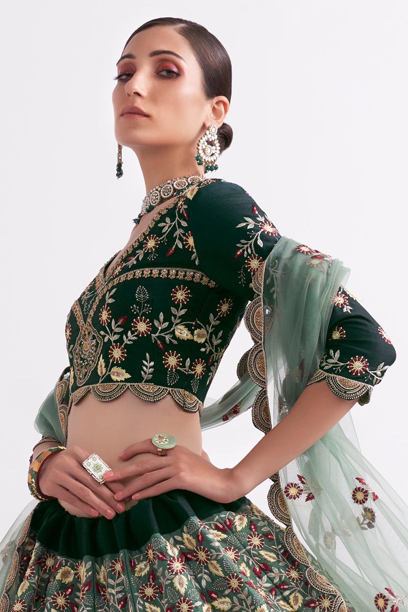 Kanika Dev Fascinating  Net Fabric Green Shaded Lehenga