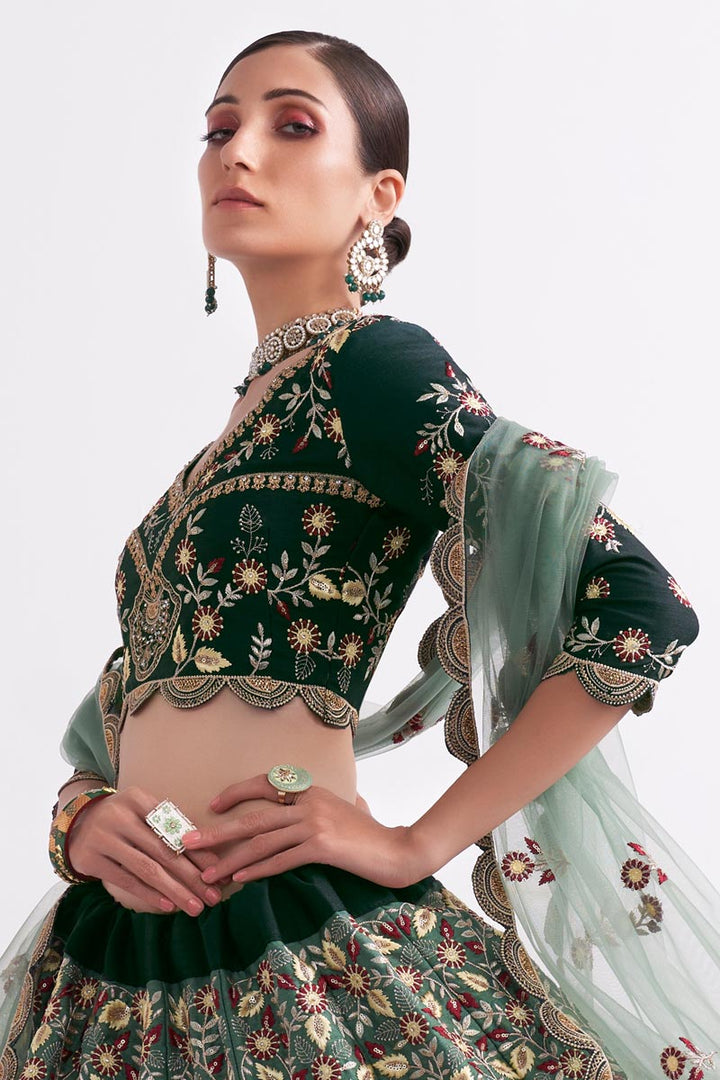 Kanika Dev Fascinating  Net Fabric Green Shaded Lehenga