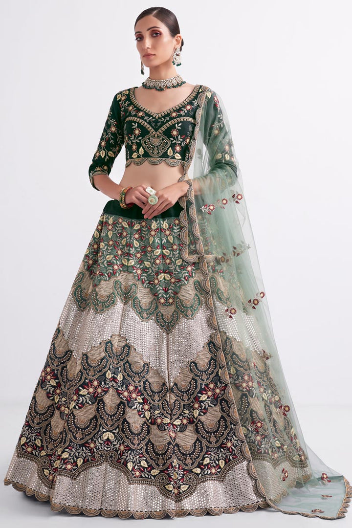 Kanika Dev Fascinating  Net Fabric Green Shaded Lehenga