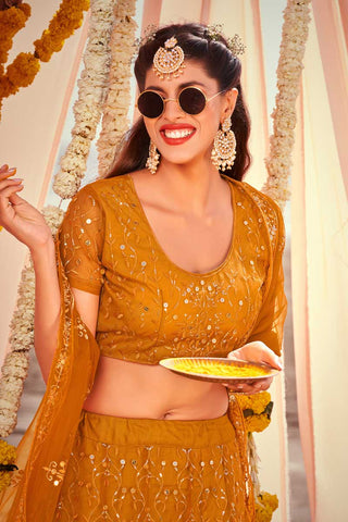 Mustard Color Embroidered Designs On Net Intriguing Lehenga