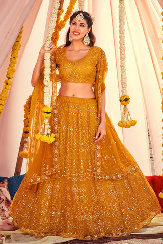 Mustard Color Embroidered Designs On Net Intriguing Lehenga