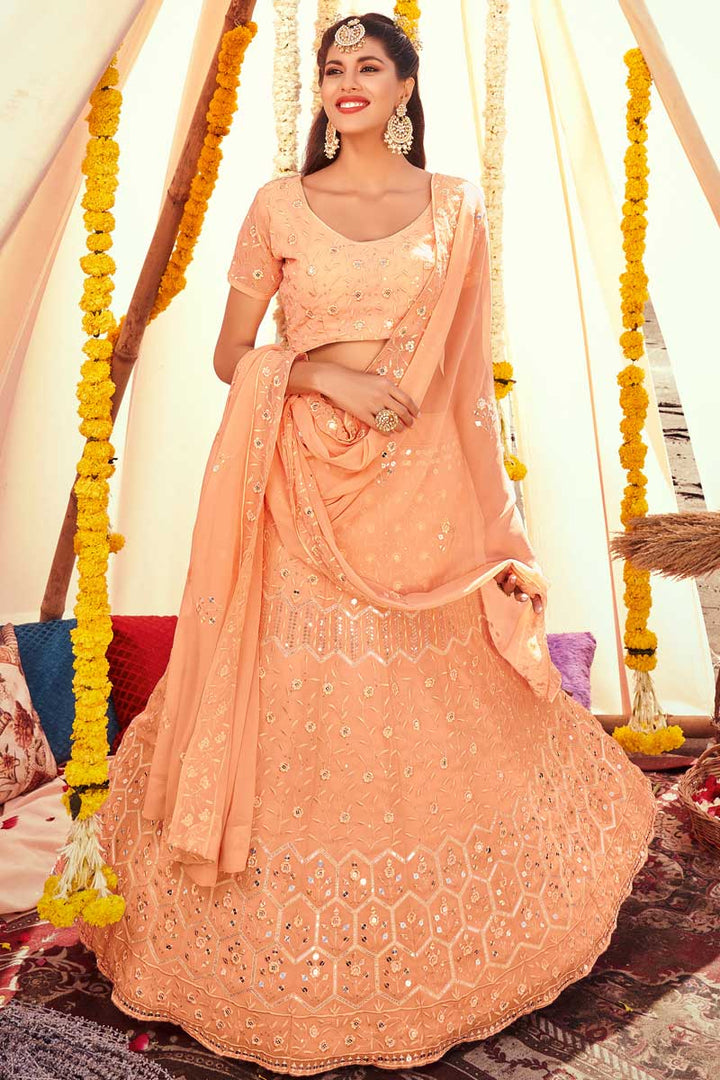 Beauteous Peach Color Embroidered Lehenga In Georgette Fabric