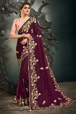 Load image into Gallery viewer, Festive Wear Satin Fabric Fancy Embroidery Work Saree In Wine Color
