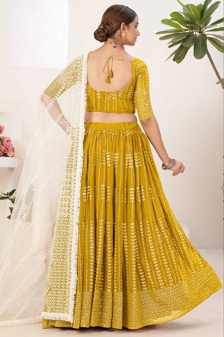 Georgette Fabric Mustard Color Lehenga With Winsome Sequins Work