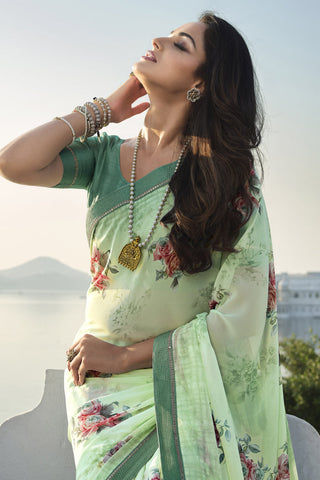 Imposing Georgette Printed Saree In Sea Green Color