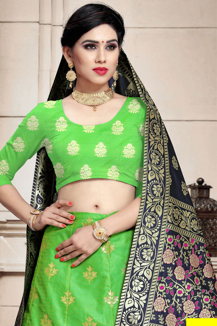 Weaving Work Art Silk Fabric Sangeet Wear Lehenga In Green Color With Ravishing Blouse