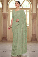 Load image into Gallery viewer, Sea Green Color Embroidered Wedding Wear Saree In Georgette Fabric
