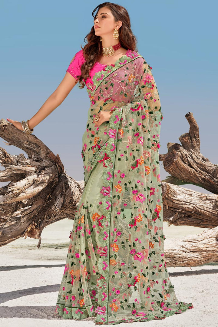 Festive Wear Net Fabric Embroidered Saree In Sea Green Color