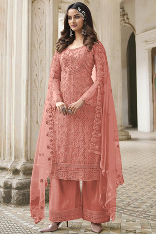 Peach Color Net Fabric Palazzo Suit With Adorning Embroidered Work