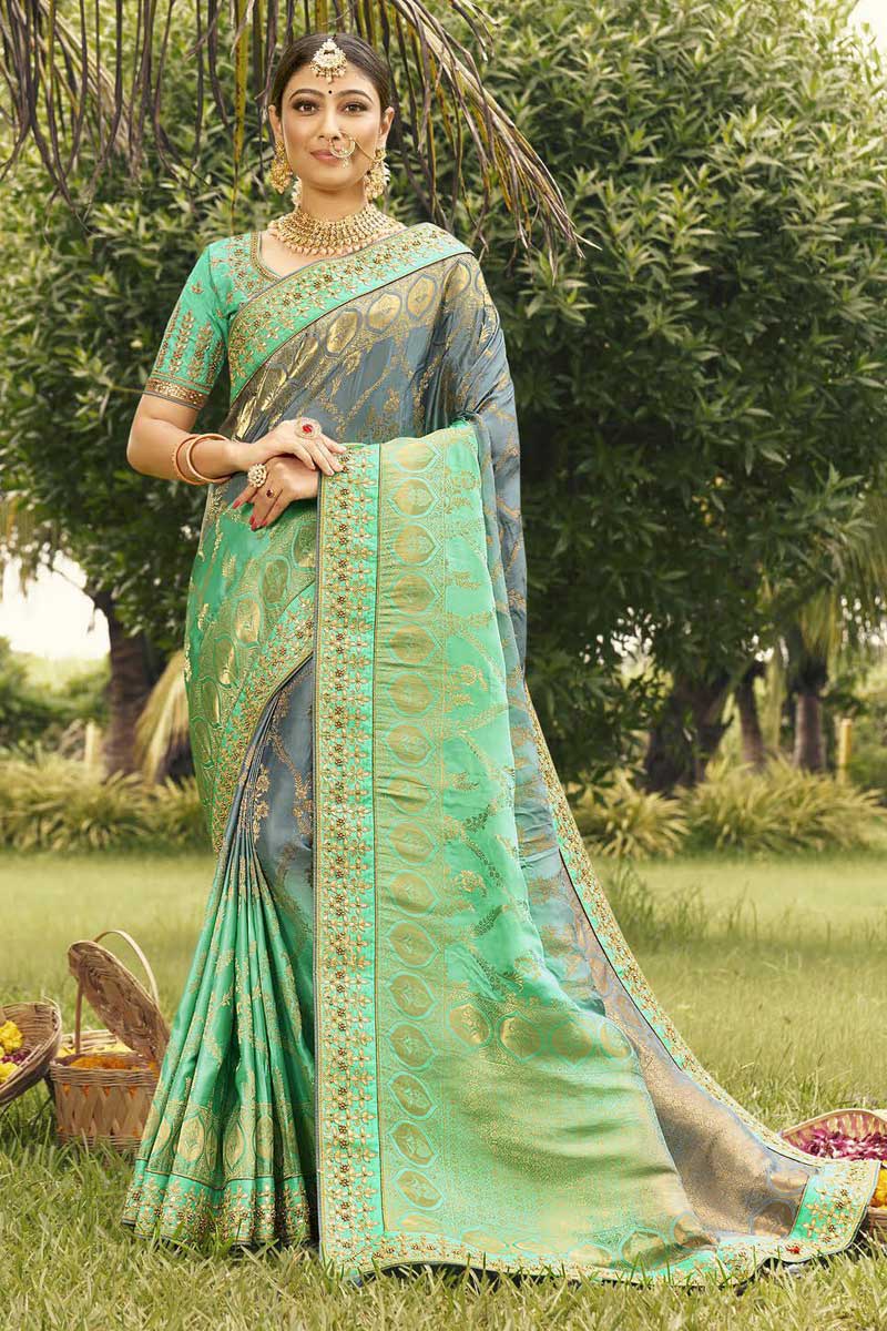 Radiant Weaving Work On Grey Color Art Silk Fabric Saree