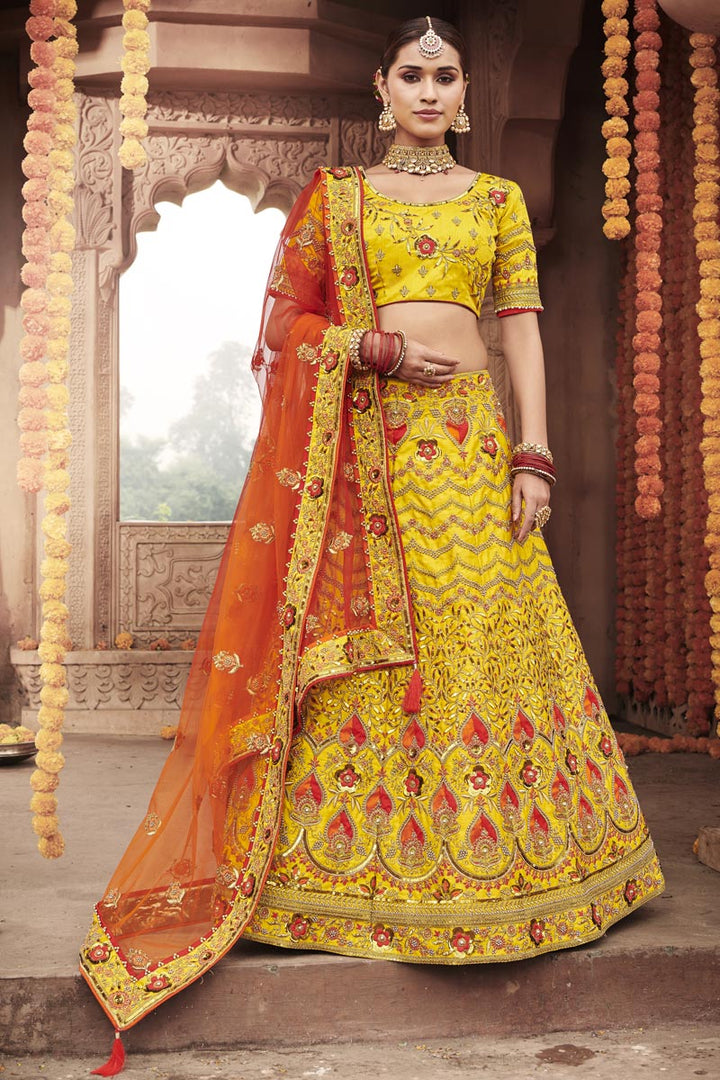Silk Fabric Wedding Function Wear Yellow Color Embroidered Lehenga