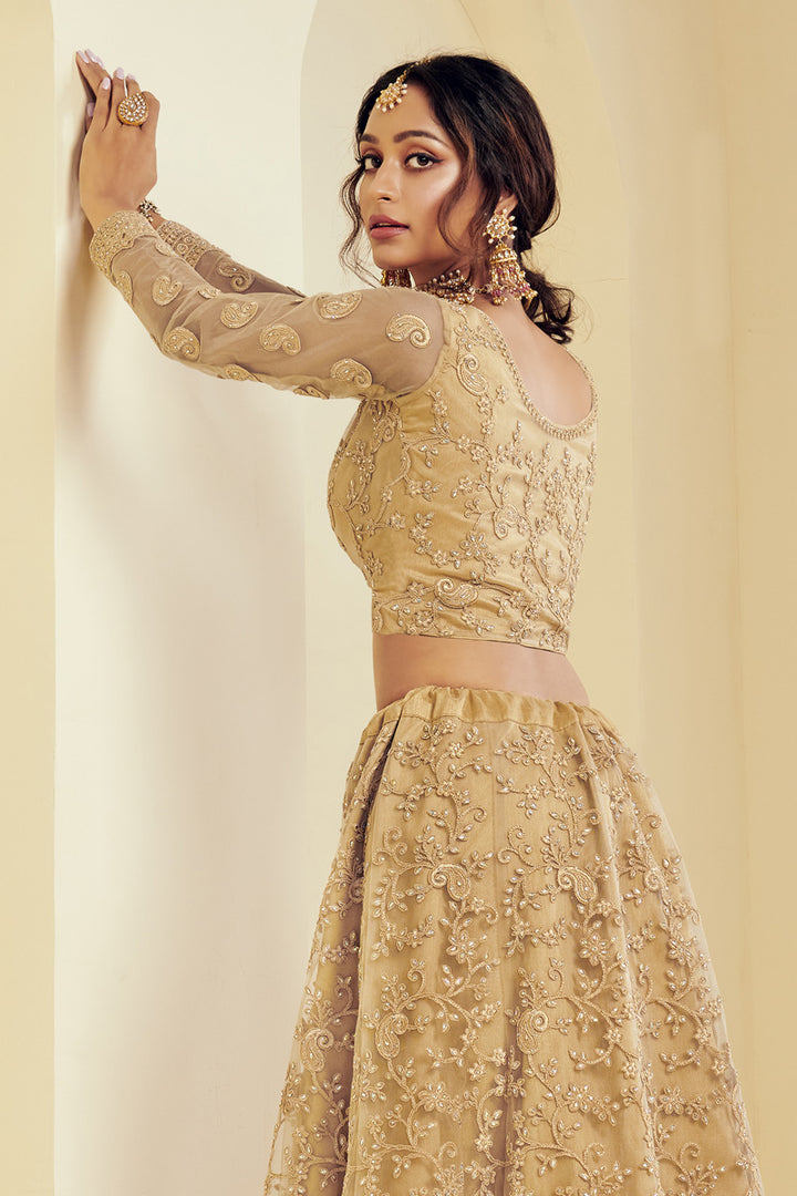 Net Fabric Sangeet Wear Fancy Golden Color Embroidered Lehenga