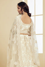 Load image into Gallery viewer, Sangeet Wear Fancy Off White Color Embroidered Net Fabric Lehenga Choli
