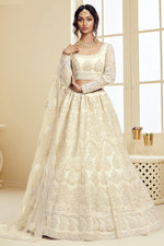 Load image into Gallery viewer, Sangeet Wear Fancy Off White Color Embroidered Net Fabric Lehenga Choli
