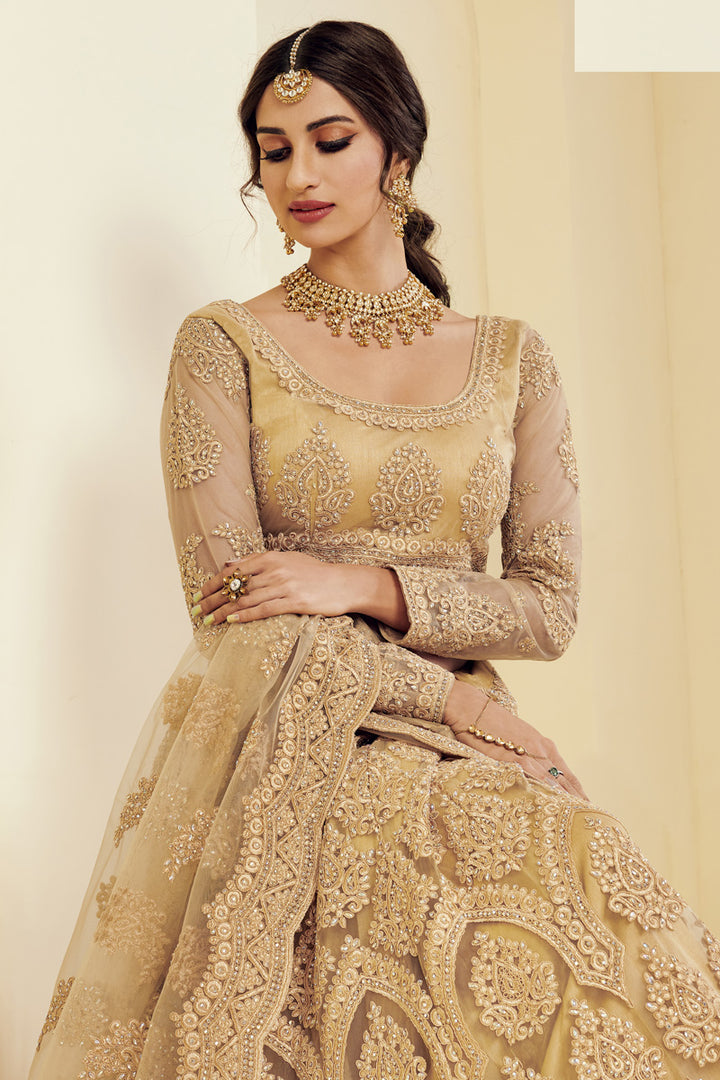 Fancy Golden Color Sangeet Wear Embroidered Net Fabric Lehenga