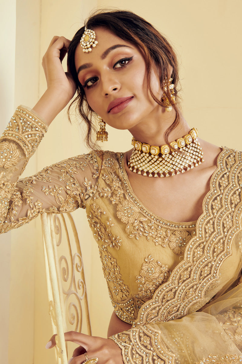 Fancy Golden Color Sangeet Wear Embroidered Lehenga In Net Fabric