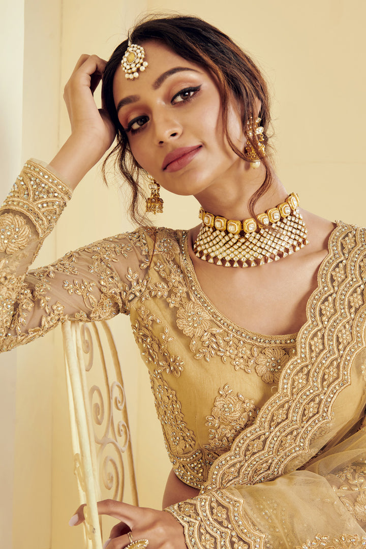 Fancy Golden Color Sangeet Wear Embroidered Lehenga In Net Fabric
