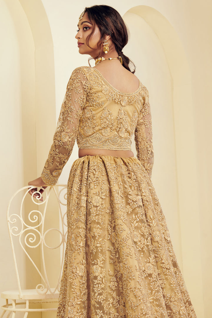 Fancy Golden Color Sangeet Wear Embroidered Lehenga In Net Fabric