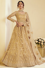 Load image into Gallery viewer, Fancy Golden Color Sangeet Wear Embroidered Lehenga In Net Fabric
