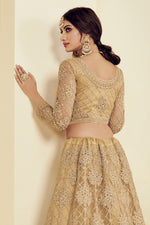 Load image into Gallery viewer, Golden Color Sangeet Wear Fancy Net Fabric Embroidered Lehenga
