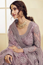 Load image into Gallery viewer, Sangeet Wear Fancy Net Fabric Embroidered Lavender Color Lehenga Choli
