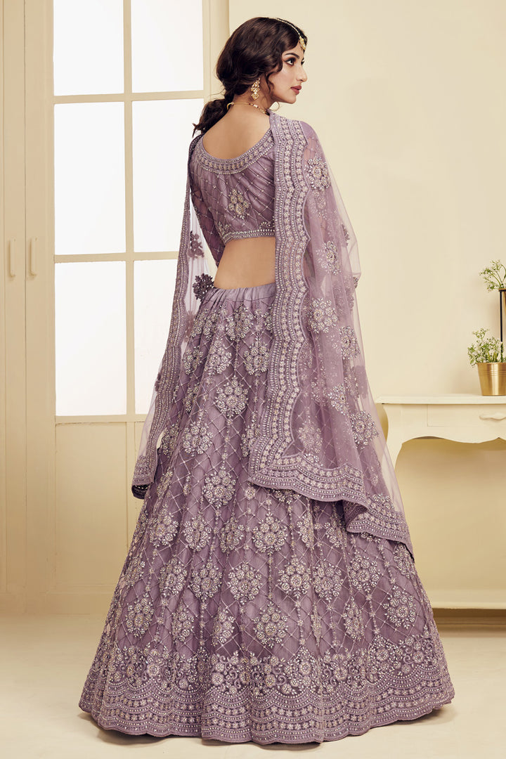 Sangeet Wear Fancy Net Fabric Embroidered Lavender Color Lehenga Choli