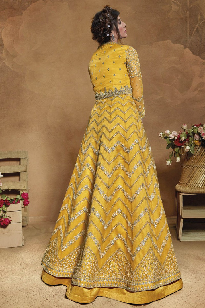 Sangeet Wear Embroidered Net Fabric Gown Style Anarkali Dress In Yellow Color