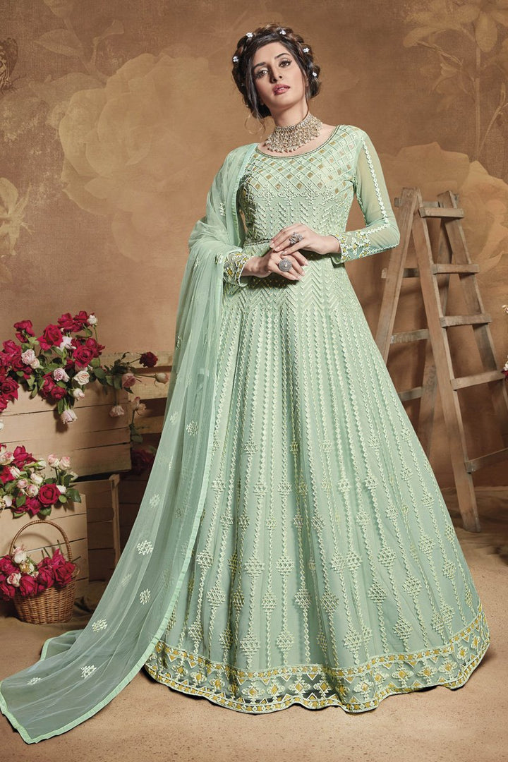 Sangeet Wear Net Fabric Embroidered Gown Style Anarkali Dress In Light Cyan Color