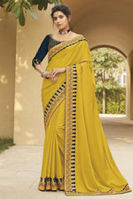 Load image into Gallery viewer, Mustard Color Fancy Fabric Festive Wear Embroidery Work Saree
