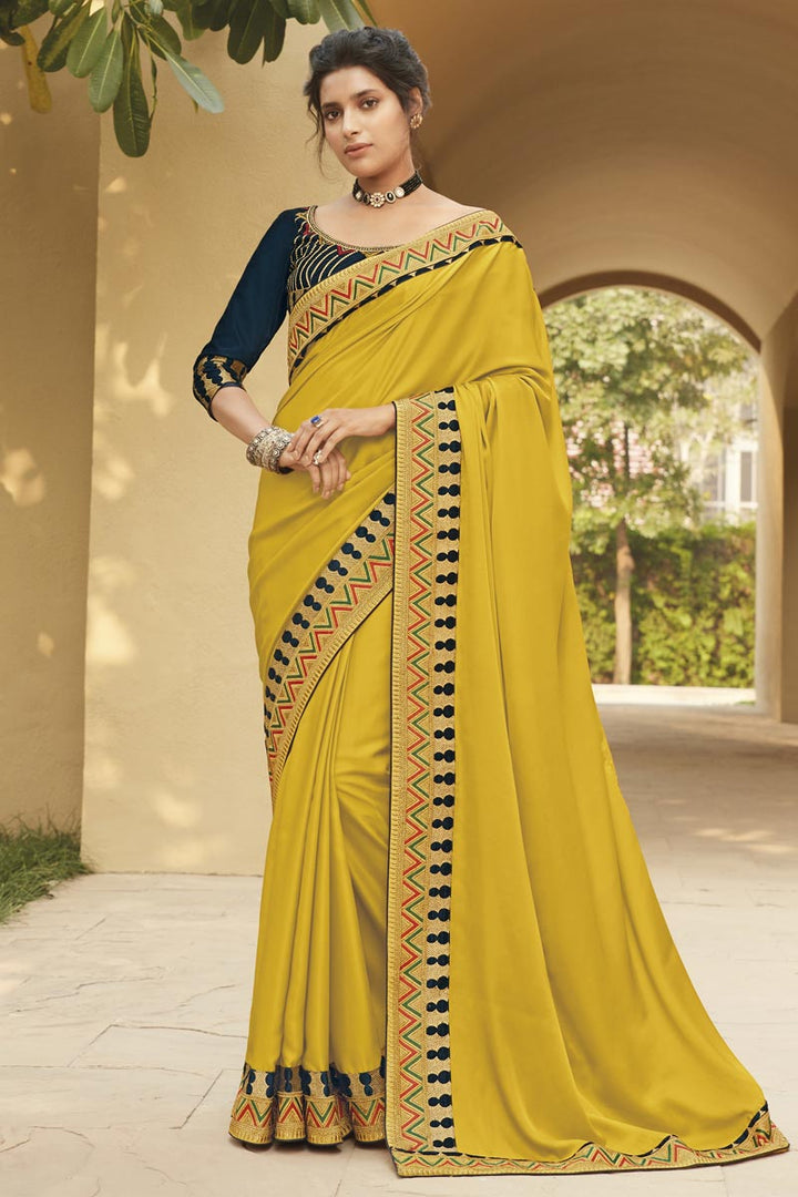Mustard Color Fancy Fabric Festive Wear Embroidery Work Saree
