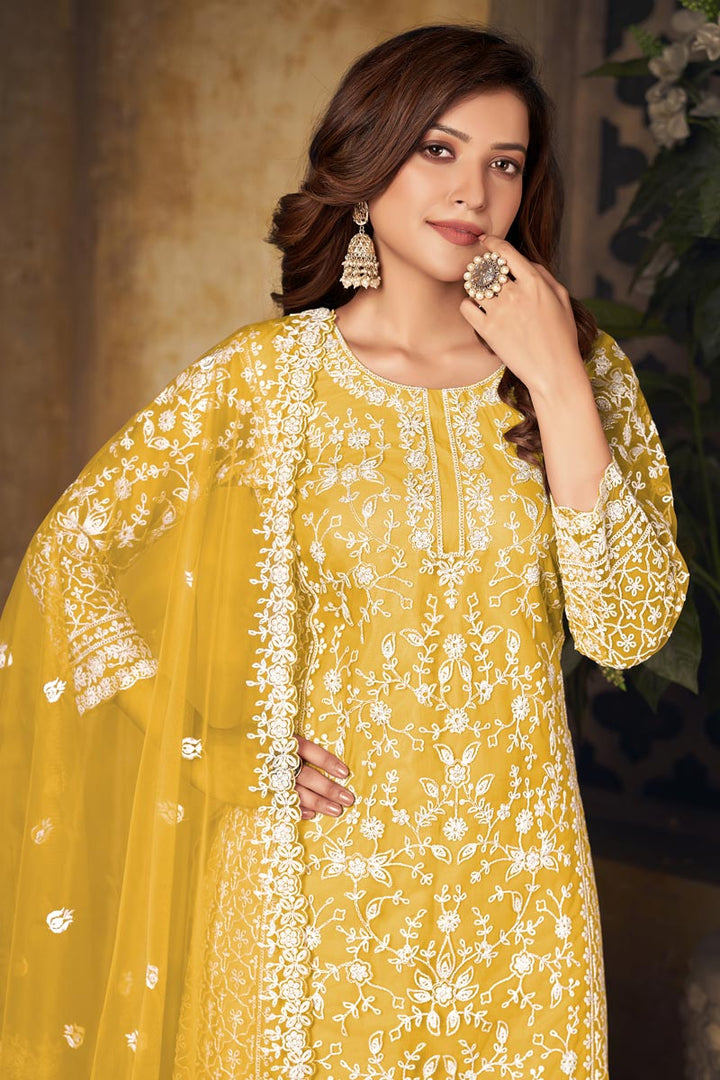 Yellow Color Embellished Embroidered Palazzo Suit In Net Fabric