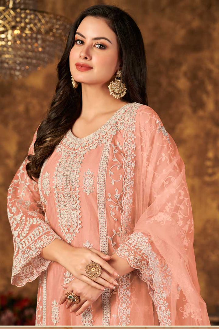 Embroidered Peach Color Fabulous Palazzo Suit In Net Fabric