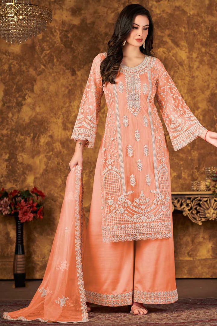 Embroidered Peach Color Fabulous Palazzo Suit In Net Fabric