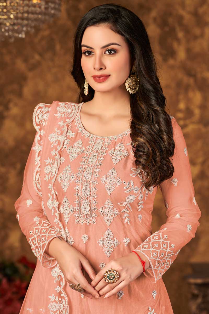 Fascinating Embroidered Work Net Fabric Palazzo Suit In Peach Color