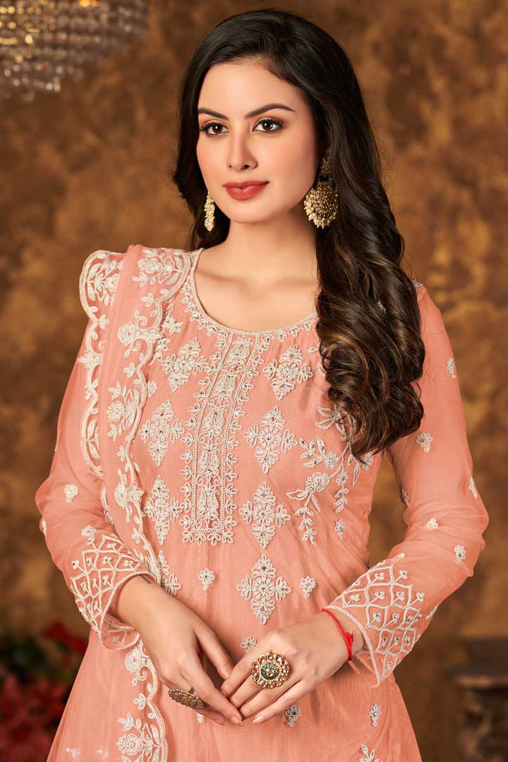 Fascinating Embroidered Work Net Fabric Palazzo Suit In Peach Color