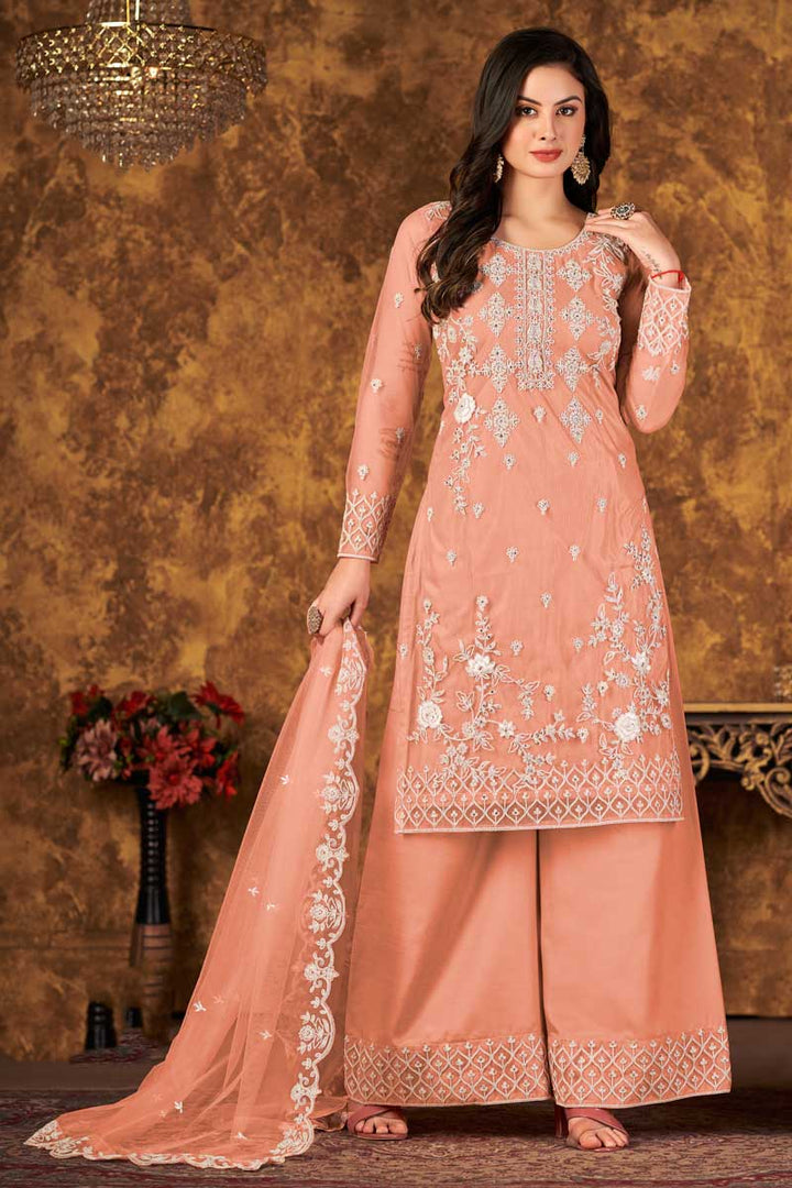 Fascinating Embroidered Work Net Fabric Palazzo Suit In Peach Color