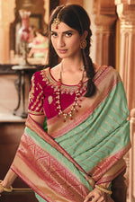 Load image into Gallery viewer, Art Silk Fabric Wedding Wear Sea Green Color Weaving Work Saree With Embroidered Blouse

