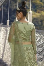 Load image into Gallery viewer, Sea Green Color Function Wear Embroidered Lehenga Choli In Net Fabric

