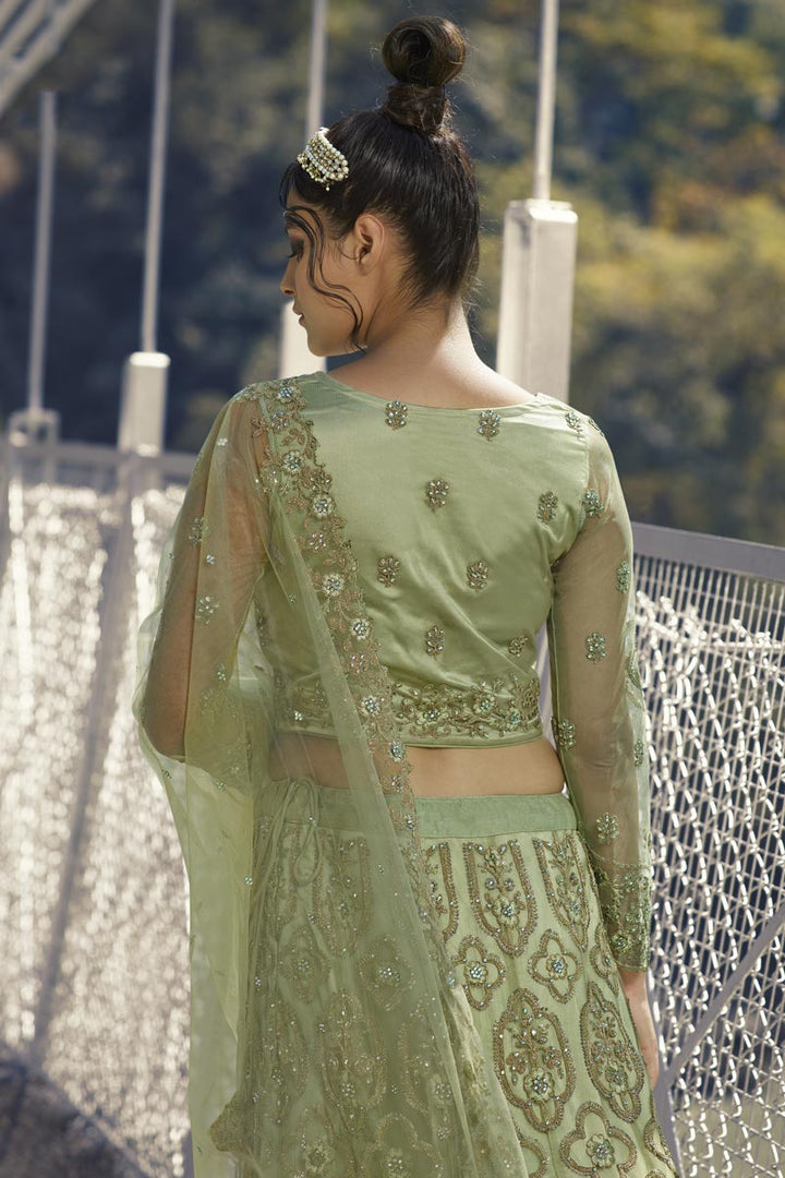 Sea Green Color Function Wear Embroidered Lehenga Choli In Net Fabric