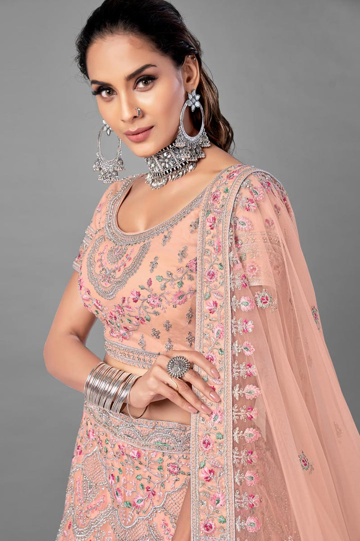 Net Fabric Peach Color Wedding Wear Thread Embroidered Lehenga Choli
