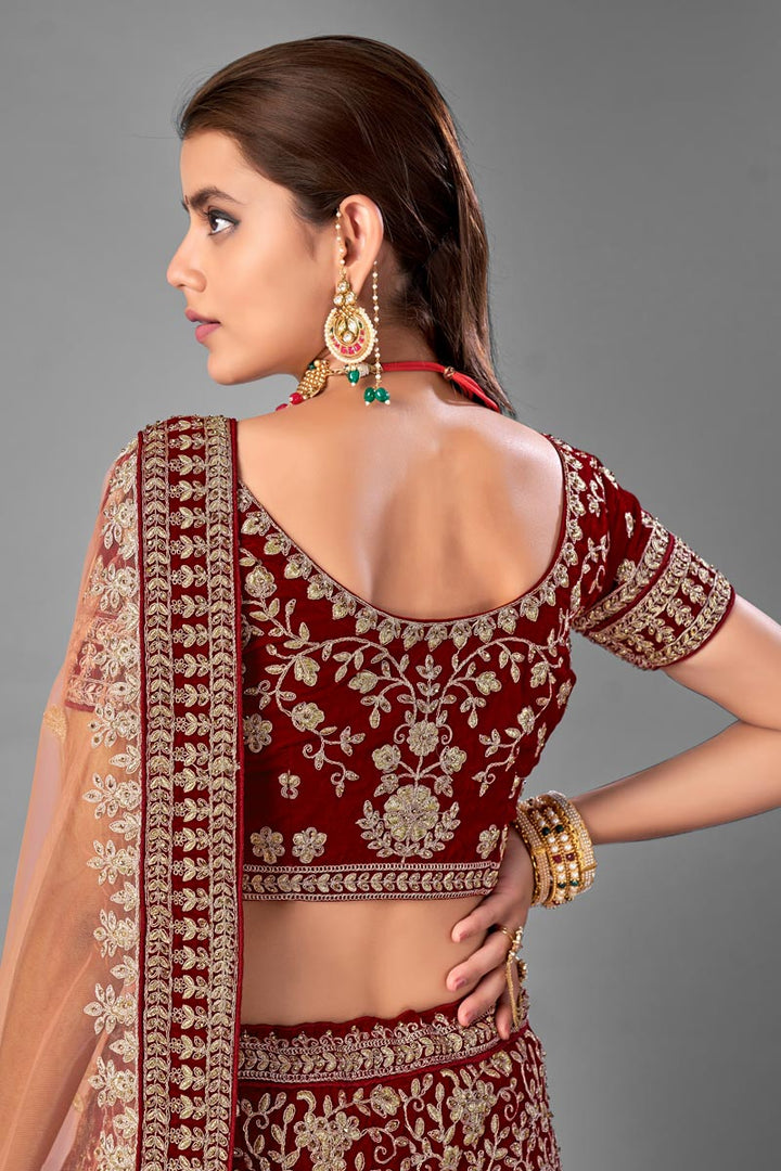 Wedding Wear Velvet Fabric Thread Embroidered Lehenga Choli In Maroon Color