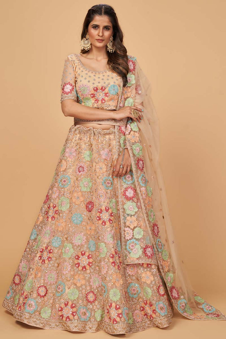 Wedding Wear Net Fabric Peach Color Thread Embroidered Work Phenomenal Lehenga With Dupatta